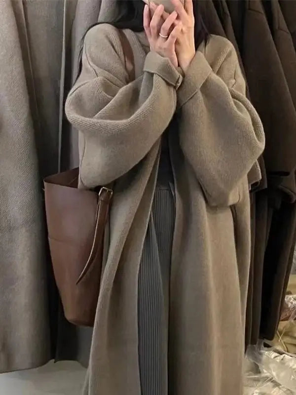 Gilet cardigan en tricot mi-long de couleur unie