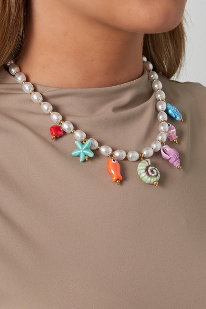 Naïa - Collier à breloques coquillages